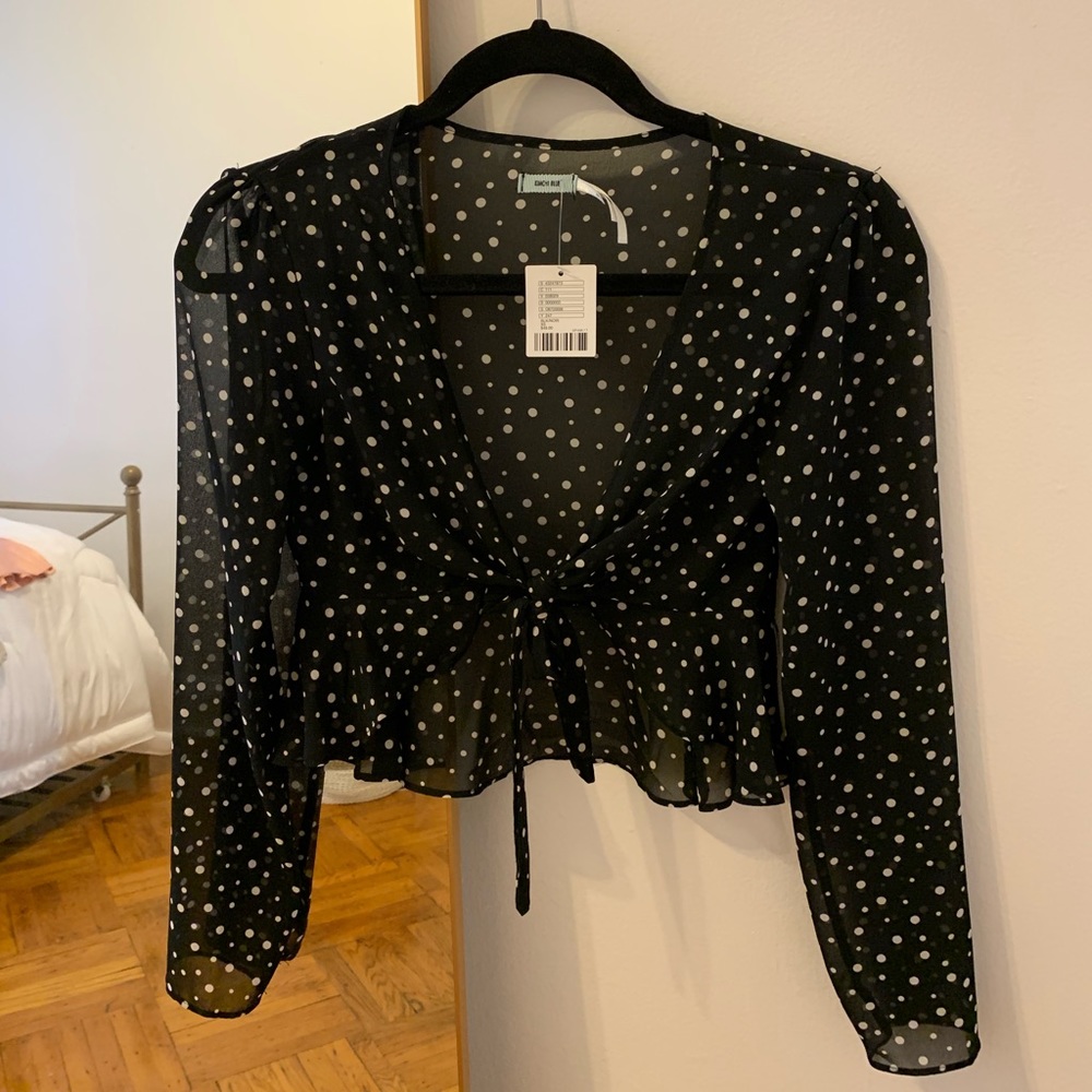 Sheer black polka dot wrap blouse
